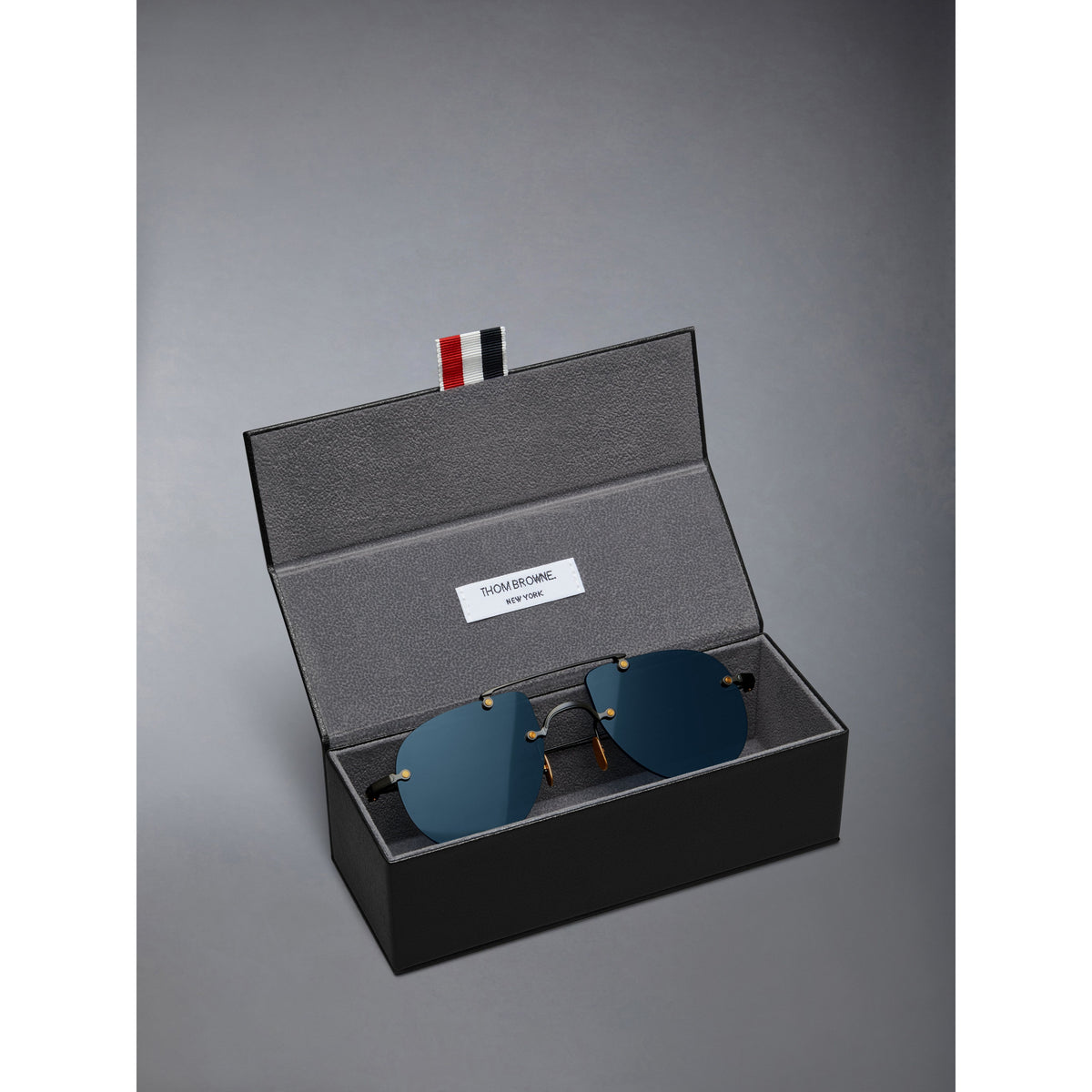 Thom Browne UES939A-G0001-005 in its original case