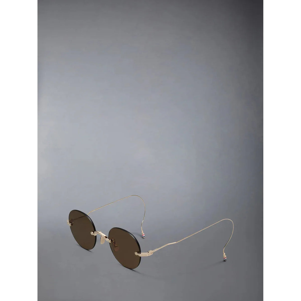 Rimless Round Sunglasses in Titanium - Point of U. | Boston