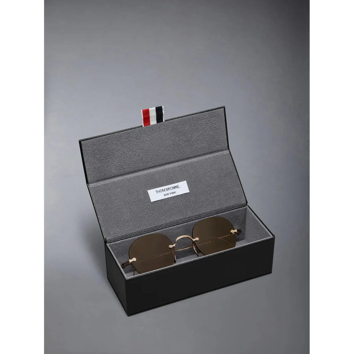 Rimless Round Sunglasses in Titanium - Point of U. | Boston